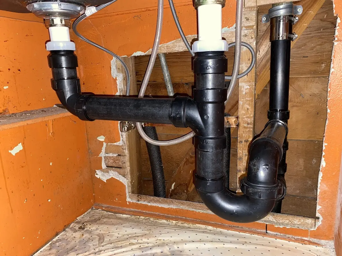 Professional Garbage Disposal Repair equipment and tools on the job in Poolesville